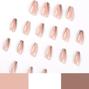 Press-on coffin nails with nude base, white French lines and gold glitter tips