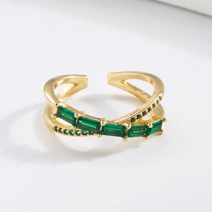 Close-up of 18K gold plated ring featuring rectangle green zircon in a double layer design