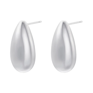 Macro shot of polished silver teardrop earrings with a smooth minimalist mirror finish
