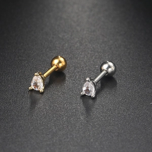 Macro detail of pear-shaped cubic zirconia stud earrings with screw ball backings