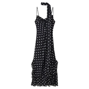Black polka dot slip dress with ruffles and matching halter neck scarf decoration