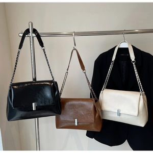Detailed comparison of vintage oil wax leather tote bags in black, brown and off-white colors