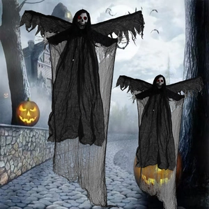 Detail showing two hanging black ghosts with glowing red eyes for Halloween outdoor decor