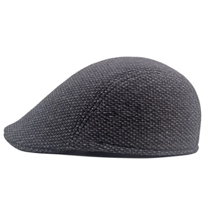 Side view showing fine woven texture of dark grey men's winter wool flat cap