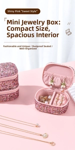Pink glitter mini jewelry box with functional internal compartments for rings and earrings