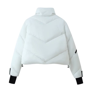 Detail view of white puffer jacket back with V-quilted texture and windproof cuffs