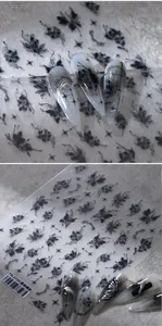 Detailed view of TS-3750 nail stickers with black ink butterfly and star designs