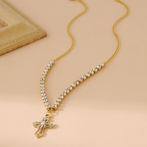 Golden stainless steel necklace with sparkling rhinestone cross pendant and tennis chain