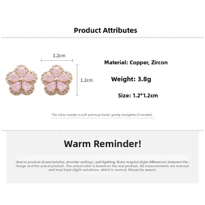 Detailed view of pink flower stud earrings with zirconia petals and silver needle