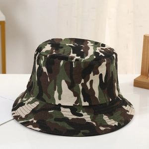 Detail shot of a forest camouflage bucket hat with a durable cotton canvas texture