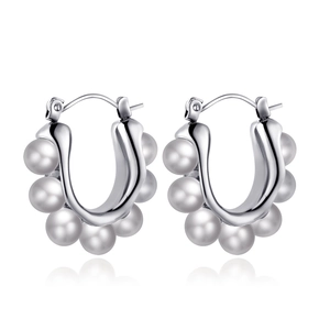 Silver U-shaped stainless steel earrings with seven white pearls on white background