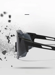 Impact resistance detail of cycling sunglasses featuring grey PC lenses and black frame