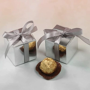 Elegant square silver mirror gift box with a grey silk ribbon bow for party favors