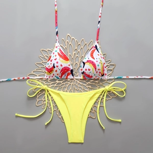 Detail of bikini top with vibrant banana print and high-elasticity swimwear fabric