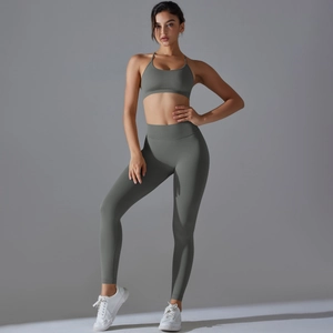 Seamless olive green yoga set with thin strap sports bra and high-waisted leggings