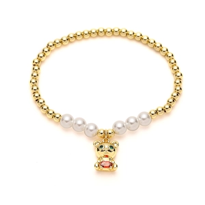 Gold-plated bear charm bracelet with white pearls and heart-shaped red zircon stones