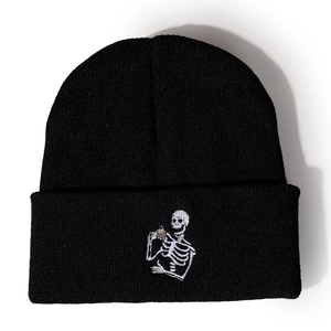 Classic black beanie hat featuring skull coffee embroidery for winter warmth