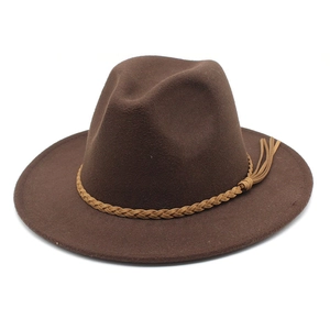 Close-up of brown wool fedora hat featuring a stylish braided band and fringe tassel