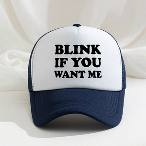 Classic blue and white trucker hat with BLINK IF YOU WANT ME print on woven background