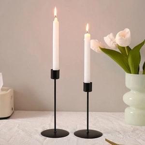 Minimalist matte black metal candle holders for romantic dinner table decor