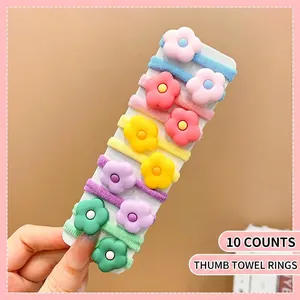 Set of 10 colorful macaron flower elastic hair ties neatly arranged on display card
