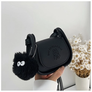 Mini black leather crossbody bag with cartoon girl print and fluffy pompom charm