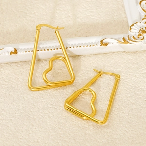 Elegant gold geometric heart drop earrings featuring a modern linear frame design
