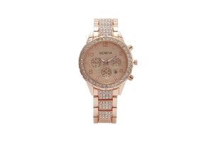 Detailed macro view of the rose gold dial with crystal bezel and chronograph subdials