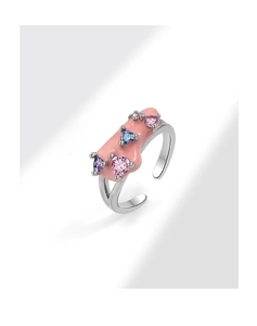 Detail view of silver adjustable ring with pink enamel and colorful heart gemstones