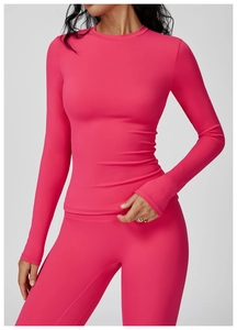 Slim fit long sleeve yoga top and leggings set in vibrant rose pink brushed fabric