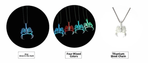 Detailed view of scorpion pendant showing blue and mixed luminous glow effects on chain