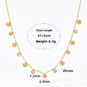 Detail showing shell pendants and cubic zirconia on a 41cm gold chain with dimensions