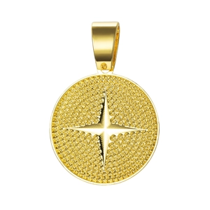 Detailed close-up of golden round pendant featuring a starburst pattern and studded textures