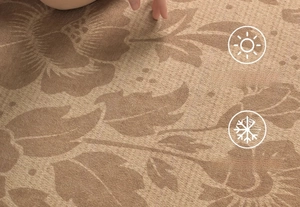 Close-up of heat-resistant jacquard rug showing floral texture and fine weaving detail