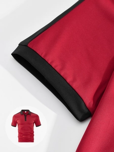 Detail of red Polo shirt with contrast black cuffs and high-quality knit texture