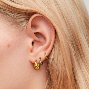 Three-piece set of gold stainless steel hoop earrings including drop and pavé designs