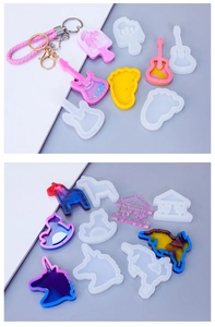 Silicone resin molds for DIY keychains featuring animal and ocean shapes with glitter effects