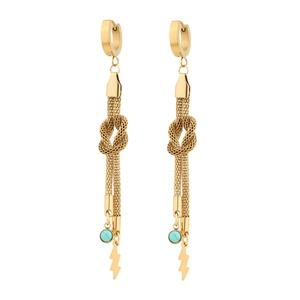 Detail of gold dangle earrings featuring turquoise beads and lightning bolt pendants