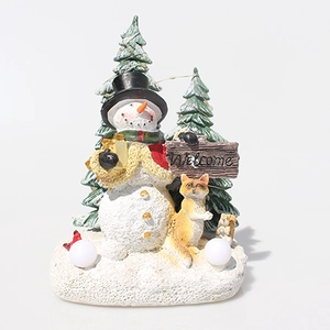 Detailed view of resin Christmas snowman with Welcome sign and glowing pine tree decor