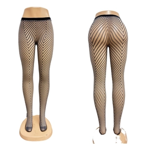 Detailed view of gray V-shaped herringbone pattern tights with slimming effect