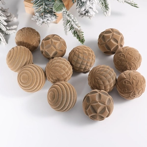 Brown flocked Christmas balls with assorted textured patterns and velvet finish on white background