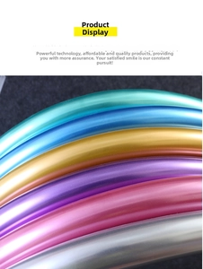 Macro shot of 260 magic balloons with metallic glossy finish in various rainbow colors