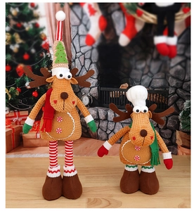 Detail of Christmas reindeer dolls featuring telescopic legs and textured corduroy fabric