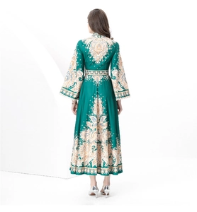 Detail of vintage palace style maxi dress with ethnic paisley print and flared hem back