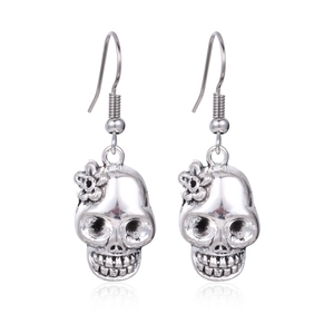 Silver skull earrings with flower detail and ear hooks for Halloween, set on white background