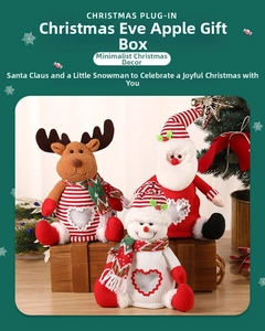 Detail of Christmas felt gift bags featuring Santa, reindeer and snowman with clear window