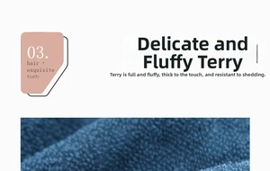 Close-up of thick blue cotton bath towel showing dense loops and absorbent texture