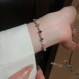 Detail of colorful cubic zirconia bracelet worn on wrist for an elegant social event