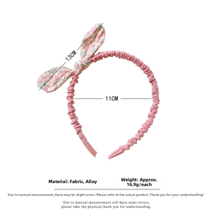 Detailed view of pink floral rabbit ear headband with dimensions 13cm and 11cm