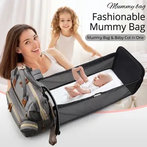 Portable 2-in-1 diaper bag and expandable baby bed with large capacity in grey fabric